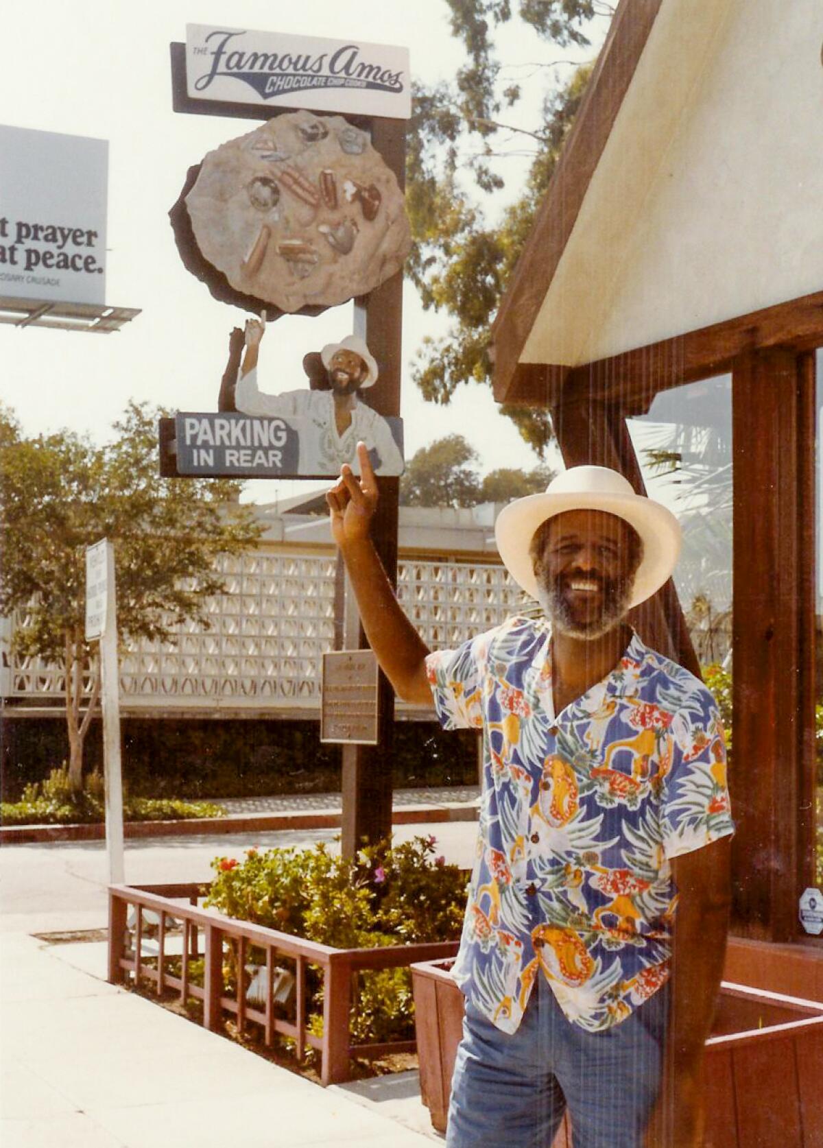 Wally Amos, of Famous Amos cookie fame, stands outside one of his L.A. locations.