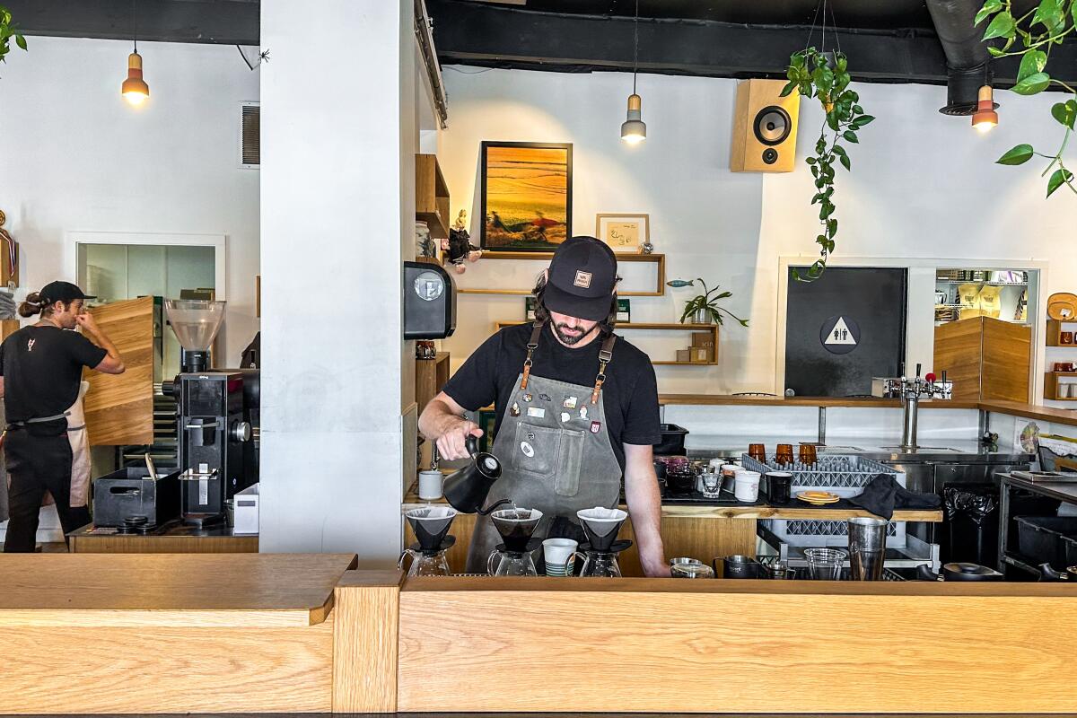 A barista makes pour-overs at Steady State Roasting in Carlsbad.