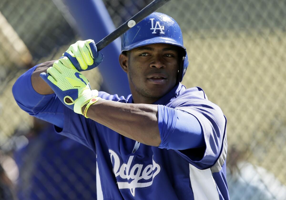 Yasiel Puig takes batting practice before the Dodgers and the Cardinals square off in Game 1 of the National League division series.