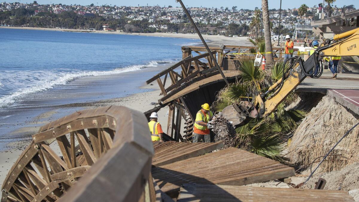 Damaged boardwalk at Capistrano Beach in Dana Point, after a big storm in 2018