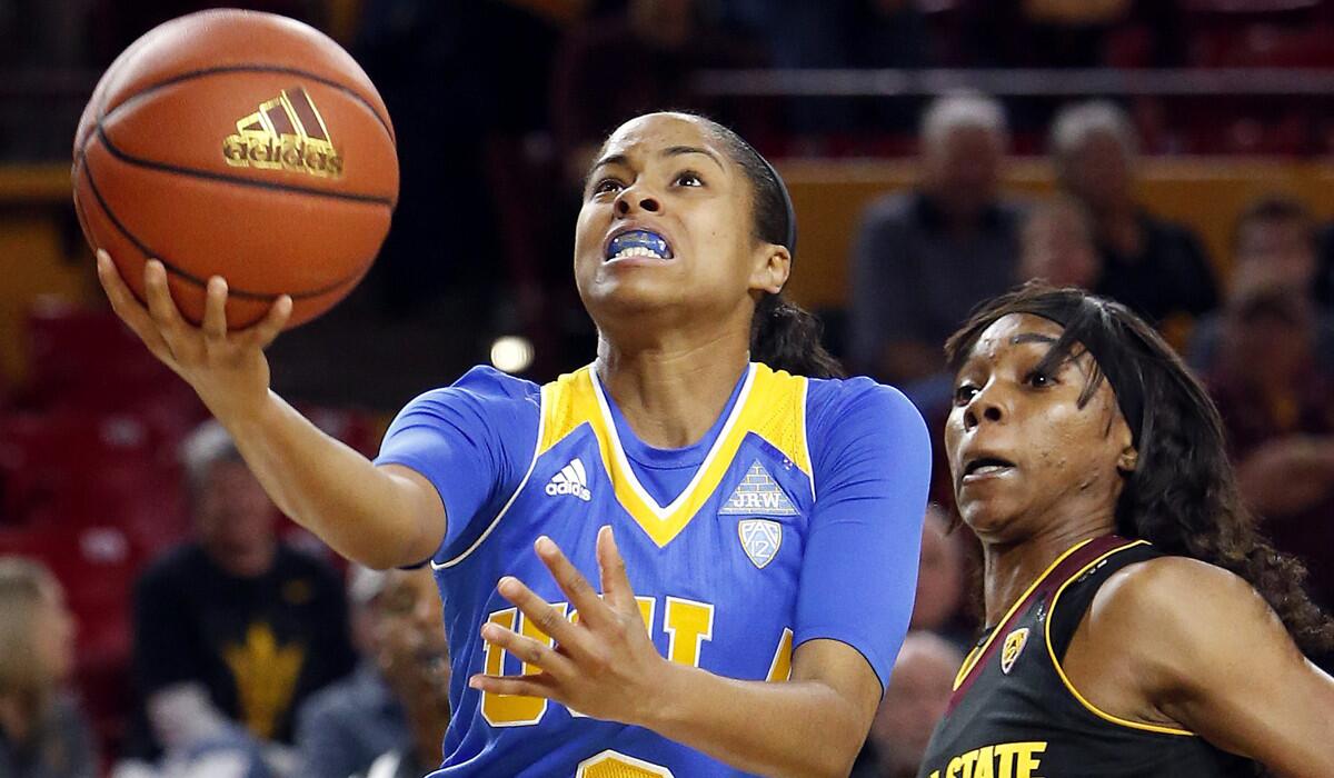 UCLA guard Jordin Canada, left, goes for the layup during the third quarter game against Arizona State on Feb. 5.