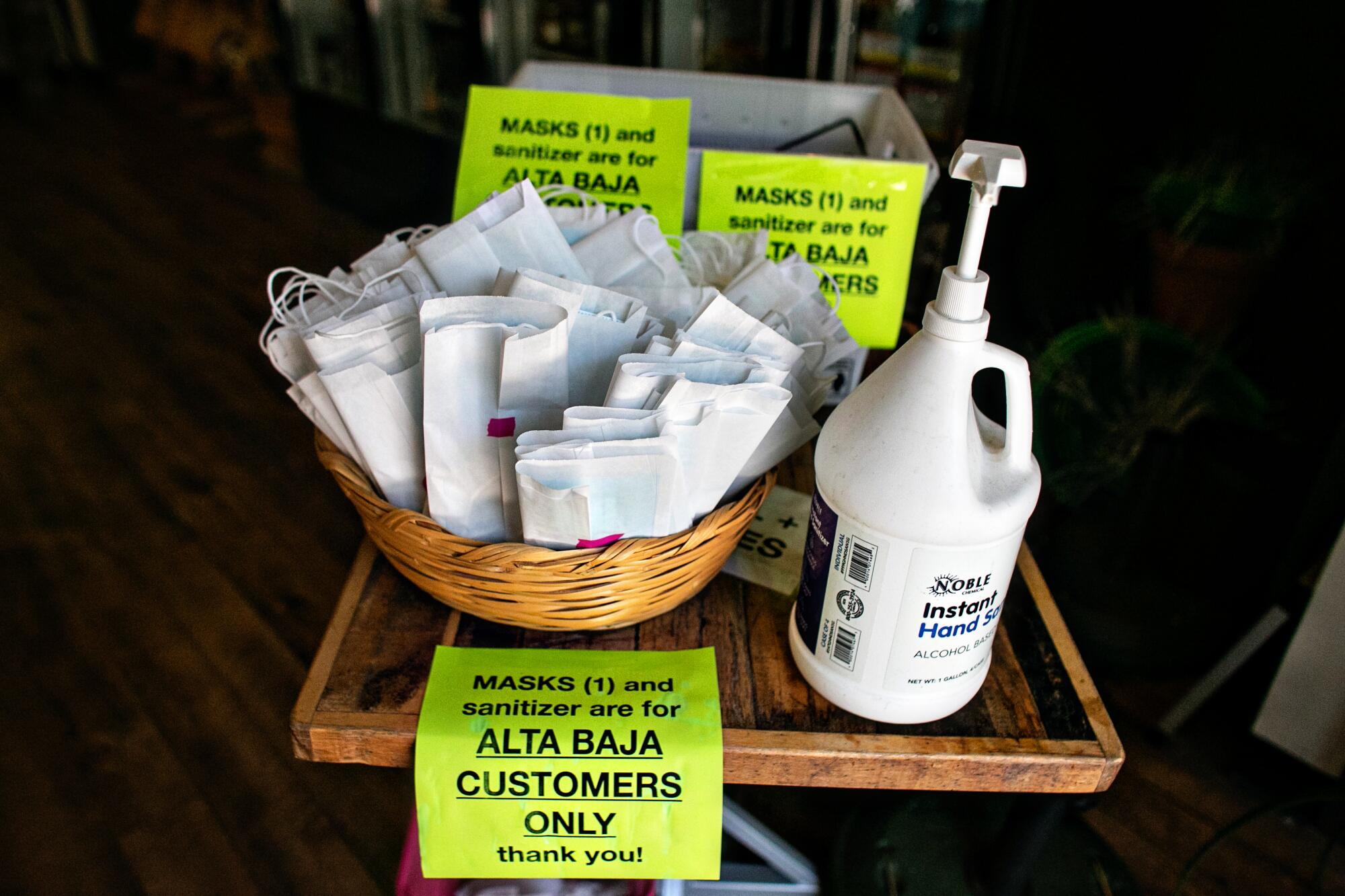Alta Baja Market provides masks and hand sanitizer to shoppers as they enter the store.