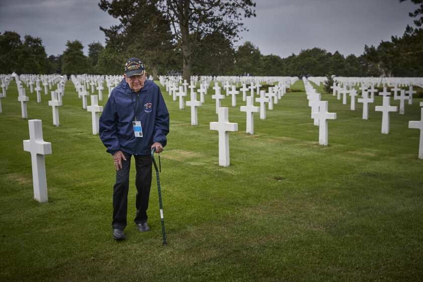 D-DAY VETERANS, FRANCE - JUNE 4: American World War II Veteran Gene Neeley, walks through the American Cemetery at Colleville-sur-Mer, Normandy, France. Veterans from across the world are arriving in the region to commemorate the 75th Anniversary of the Allied D-Day invasion on the French coast that became a crucial turning point in World War II, leading to the defeat of Nazi Germany. Photo by Kiran Ridley
