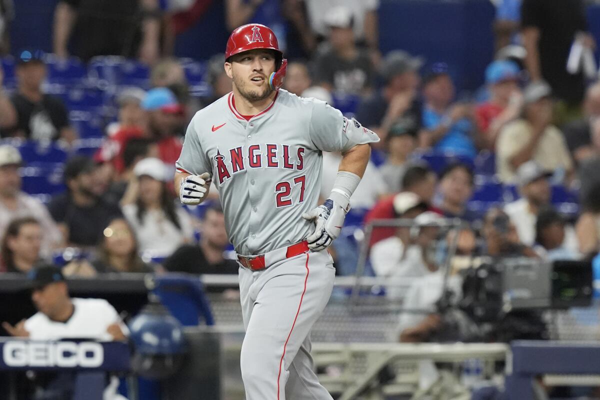 Angels star Mike Trout runs the bases after hitting a home run in the fourth inning Monday against the Miami Marlins.