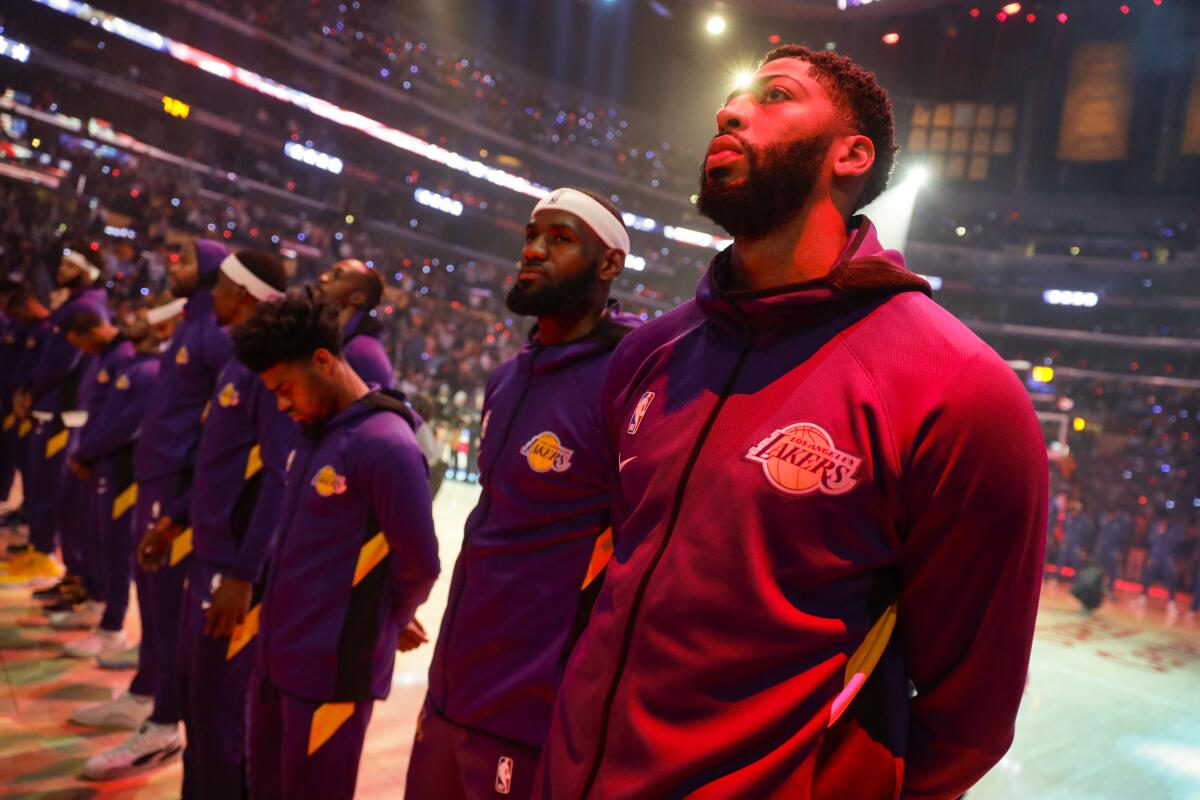 LOS ANGELES, CA, WEDNESDAY, OCTOBER 16, 2019 - Los Angeles Lakers forward Anthony Davis (3) and Los Angeles Lakers forward LeBron James (23) before taking on the Warriors in a preseason game at Staples Center. (Robert Gauthier/Los Angeles Times)