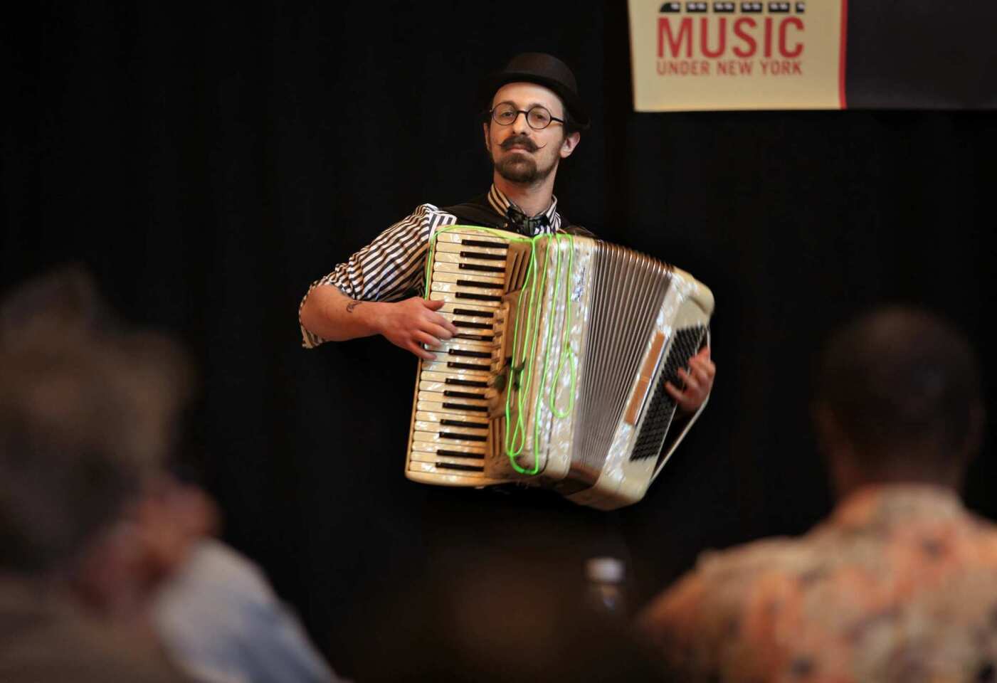 Accordion player Matt Dallow, 32, auditions in front of a panel of judges for Music Under New York in Grand Central Station. MUNY holds yearly auditions to determine who will get official positions to play music in the New York subways.