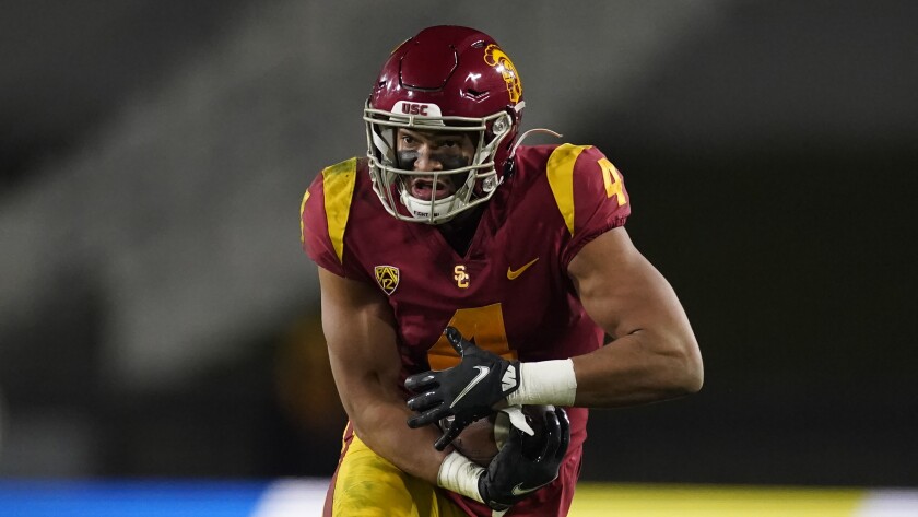 USC wide receiver Bru McCoy runs the ball during the 2020 Pac-12 championship game against Oregon.