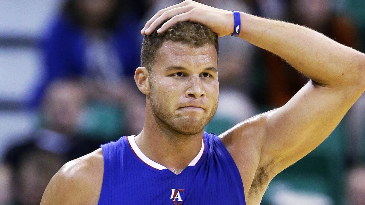 Clippers power forward Blake Griffin walks off the court during a game against Utah Jazz on Oct. 13.