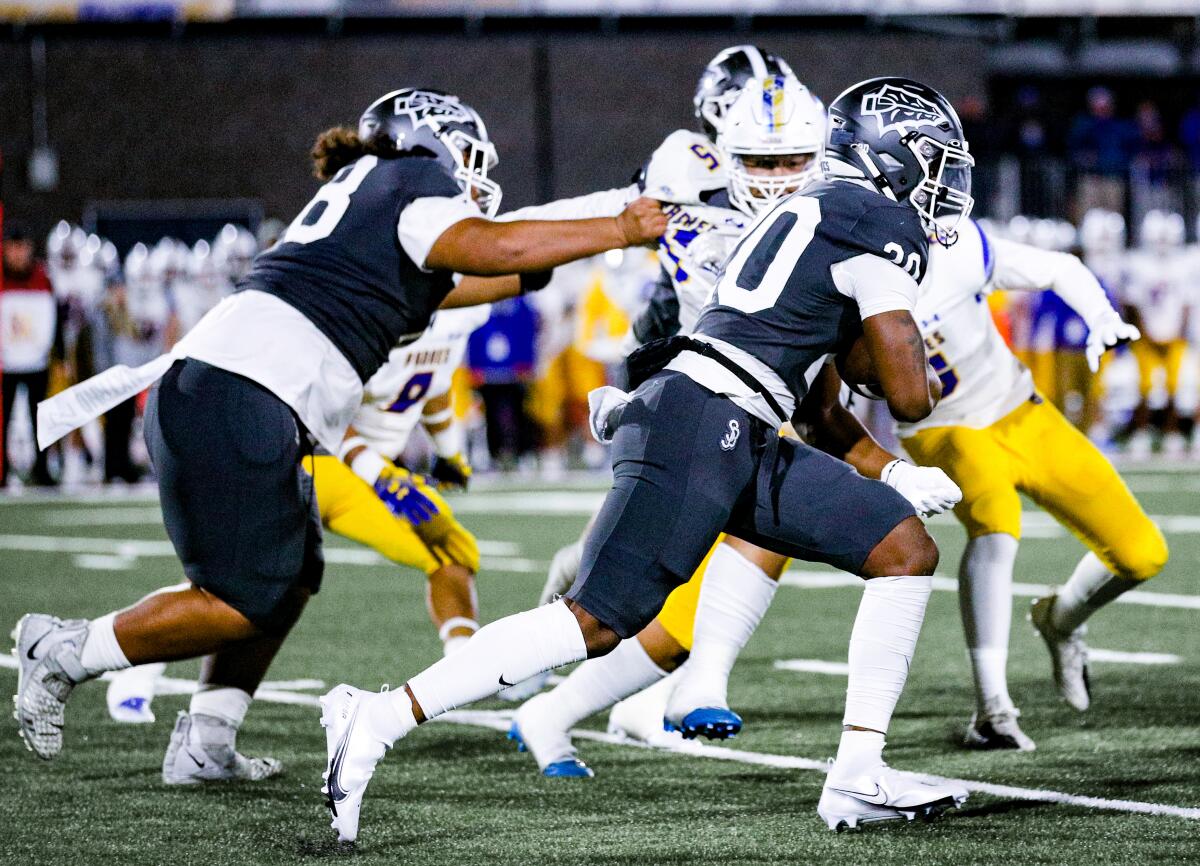 St. John Bosco running back Cameron Jordan finds room to run against San Mateo Serra.