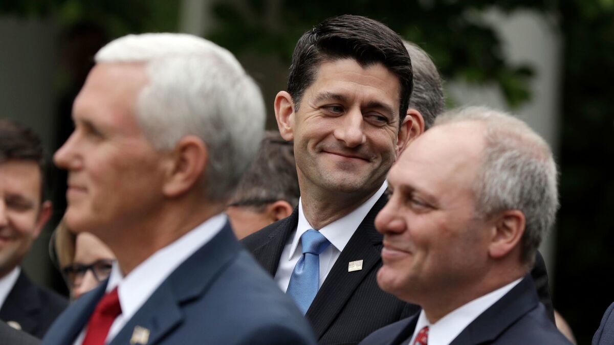 Happier times: House Majority Whip Steve Scalise (R-La.), right, celebrated passage of the House GOP Obamacare repeal bill May 4 in the Rose Garden of the White House with Speaker Paul D. Ryan of Wisconsin (center) and Vice President Mike Pence.