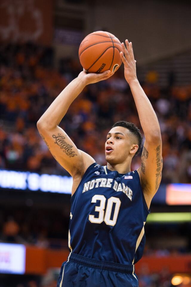 Zach Auguste shoots the ball during the first half against Syracuse.