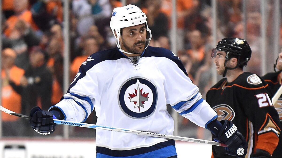 Winnipeg Jets defenseman Dustin Byfuglien reacts after a goal by the Ducks during Game 1 of the Western Conference quarterfinals at Honda Center on Thursday.