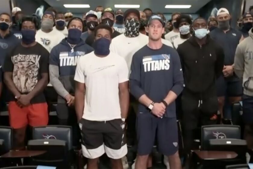 In a screenshot from a Zoom call, Tennessee Titans players speak about the decision to cancel NFL football practice Thursday, Aug. 27, 2020, in Nashville, Tenn. Several NFL teams canceled practice in response to the shooting of Jacob Blake, a Black man, in Wisconsin. In front are safety Kevin Byard, left, and quarterback Ryan Tannehill, right. (AP Photo)