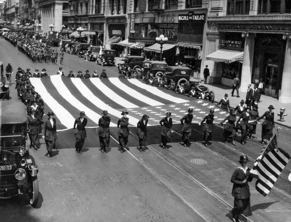 May 31, 1920: Red Cross nurses who served in World War I march in Memorial Day Parade.