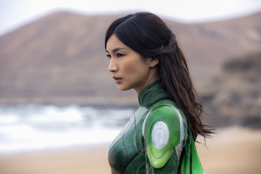 Gemma Chan wears a green superhero suit in "Eternals."