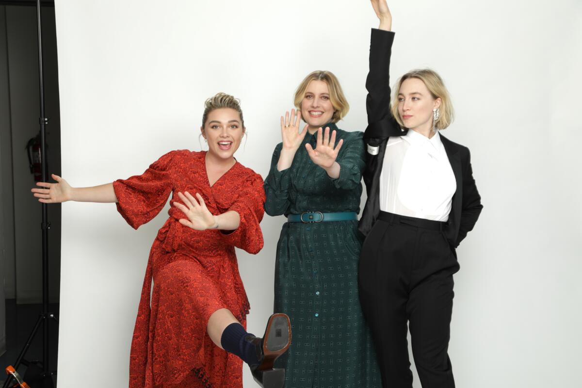 Florence Pugh, left, director Greta Gerwig and Saoirse Ronan of “Little Women.”