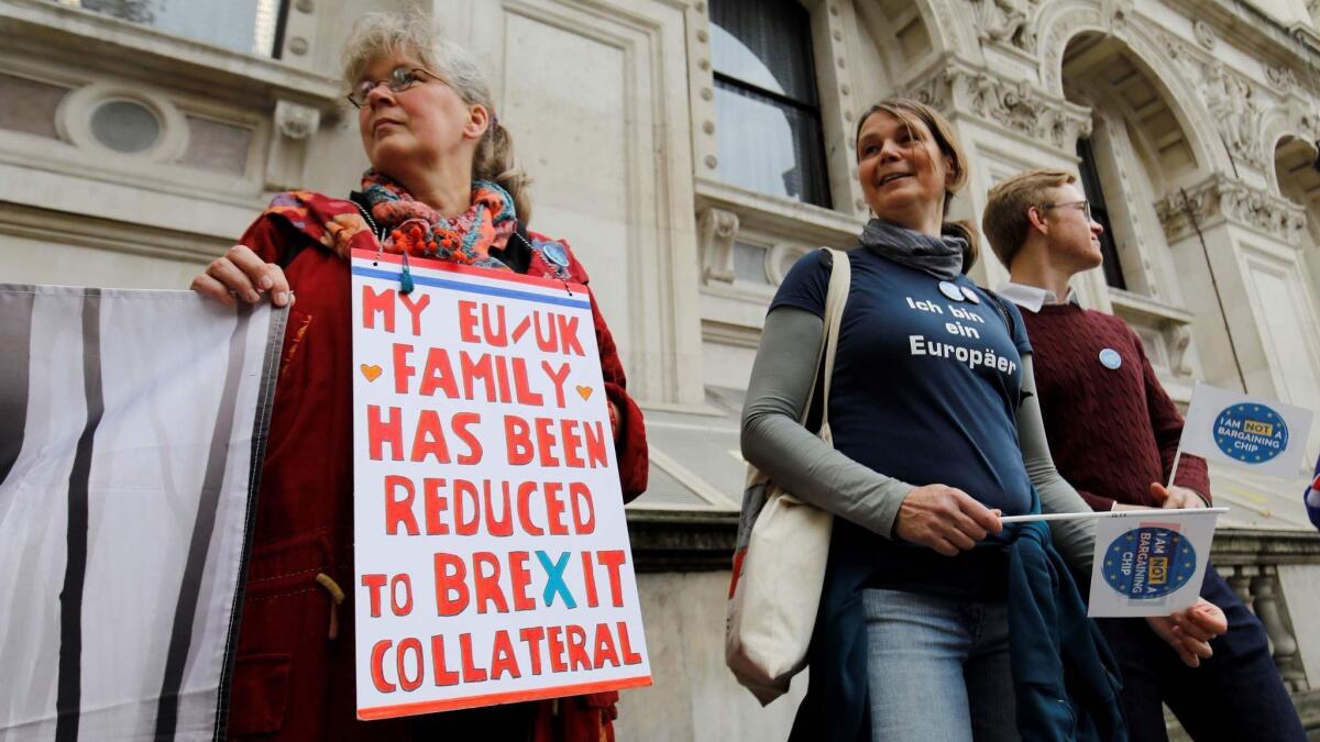 Demonstrators in central London call on the British government to clarify the status of European Union nationals living in the United Kingdom after its exit from the EU.