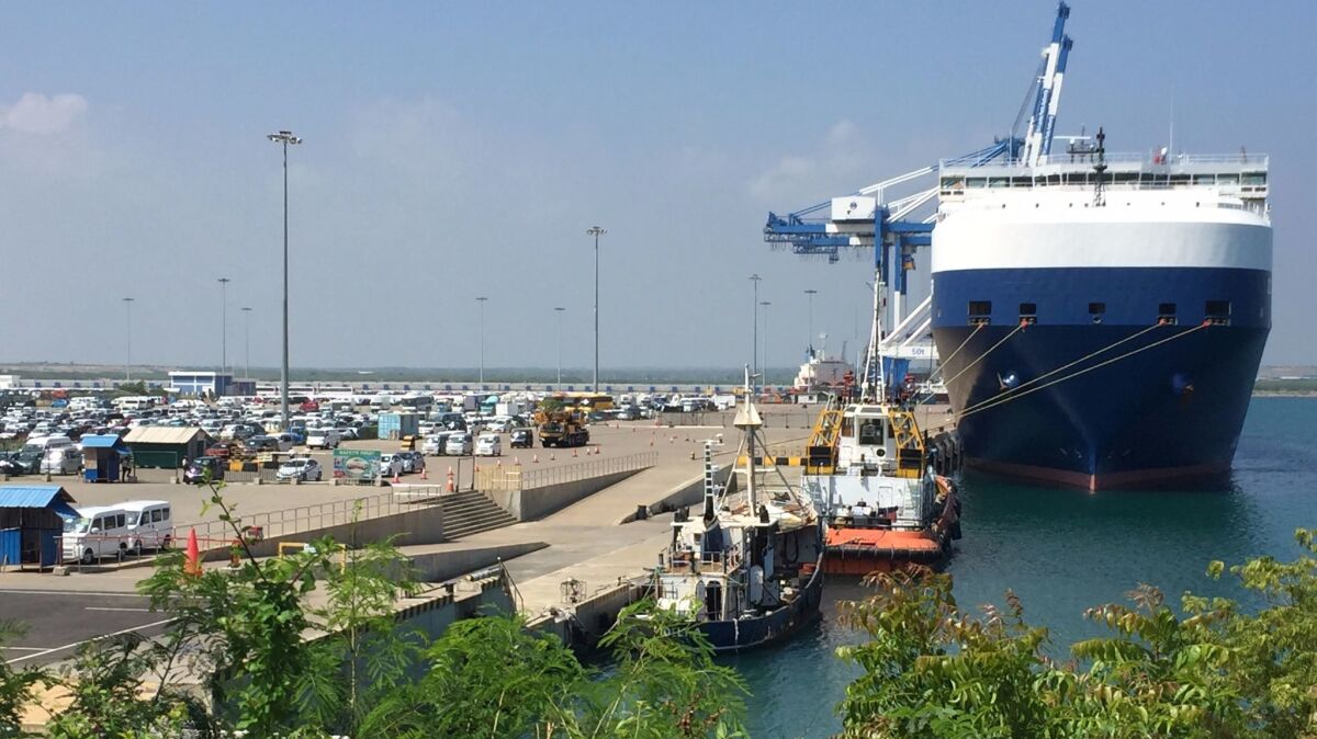 A car transporter docks at Hambantota port in Sri Lanka.