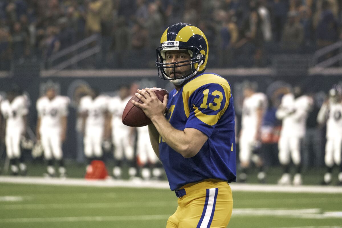 A football player prepares to throw a pass in “American Underdog: The Kurt Warner Story.”