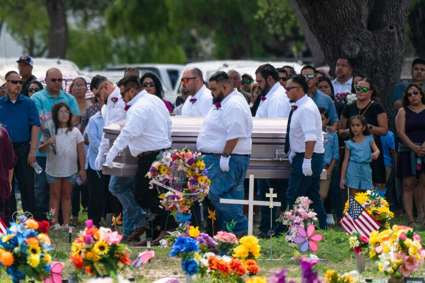 Pallbearers carry the casket of Amerie Jo Garza to her burial site in Uvalde, Texas, Tuesday, May 31, 2022.
