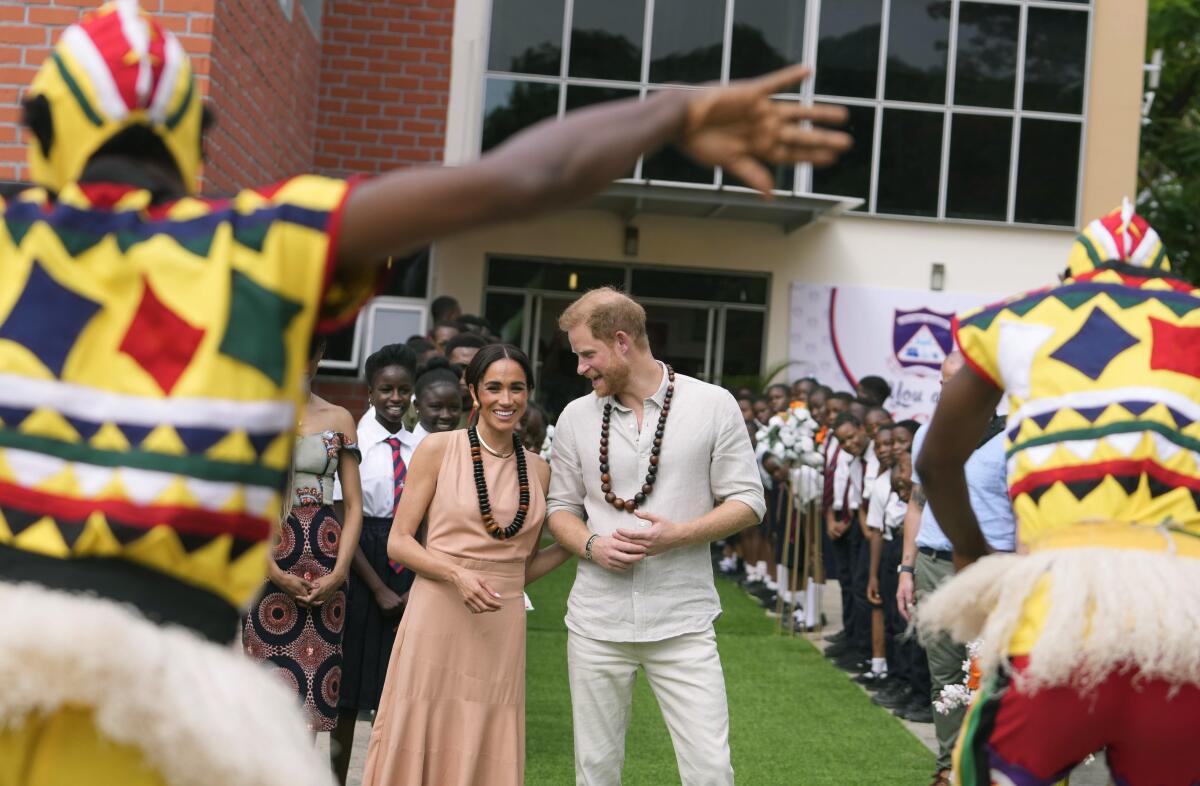 Mixing games and education, Prince Harry and Meghan arrive in Nigeria to promote mental health - The San Diego Union-Tribune