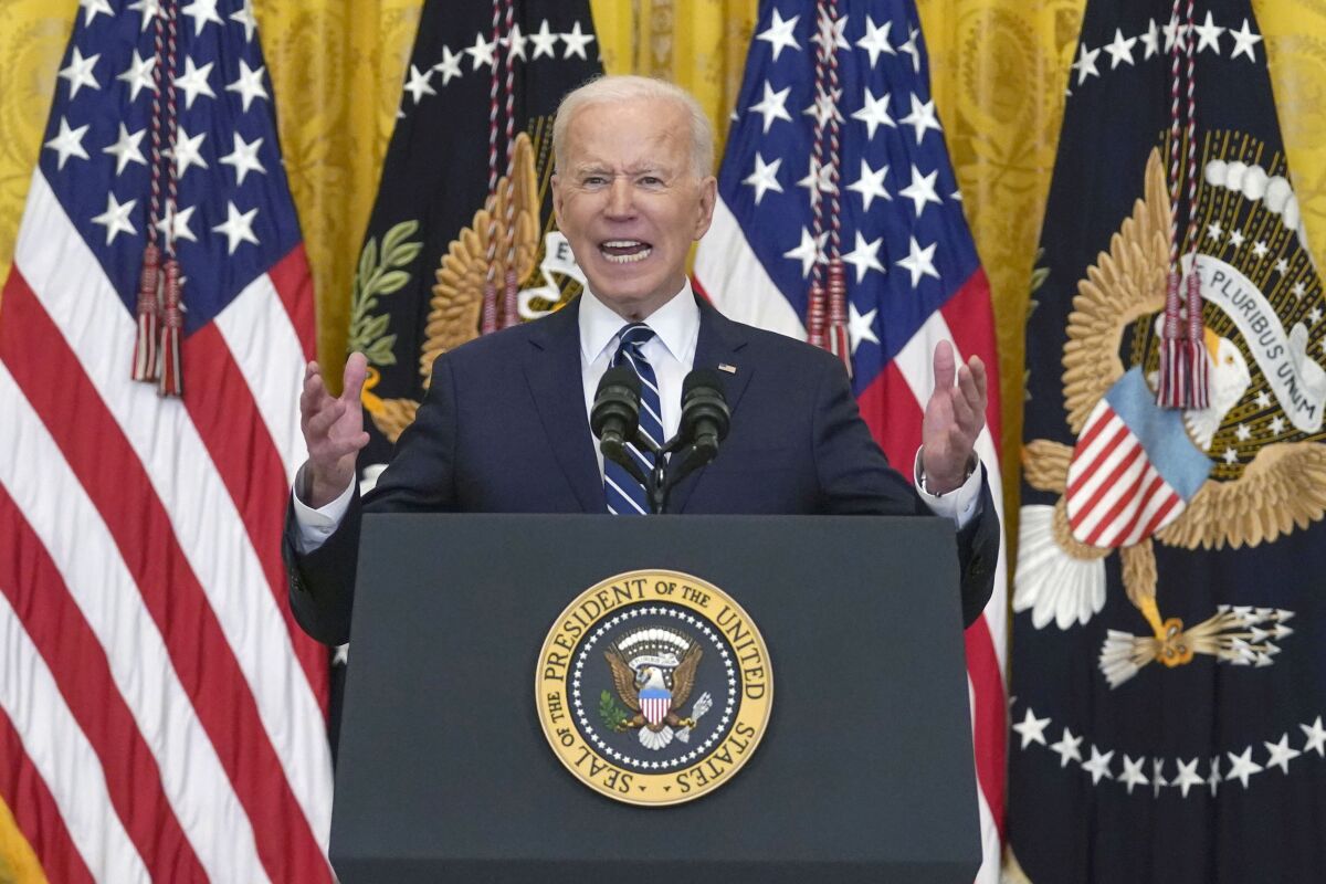 President Biden speaks during a news conference in the East Room of the White House