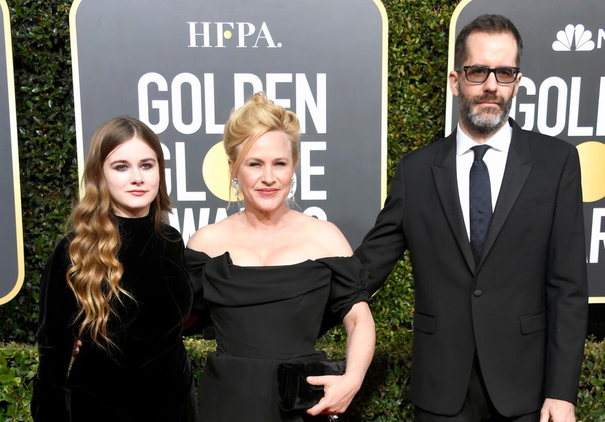 Harlow Jane-Arquette, left, Patricia Arquette and Eric White at the 76th Golden Globes.