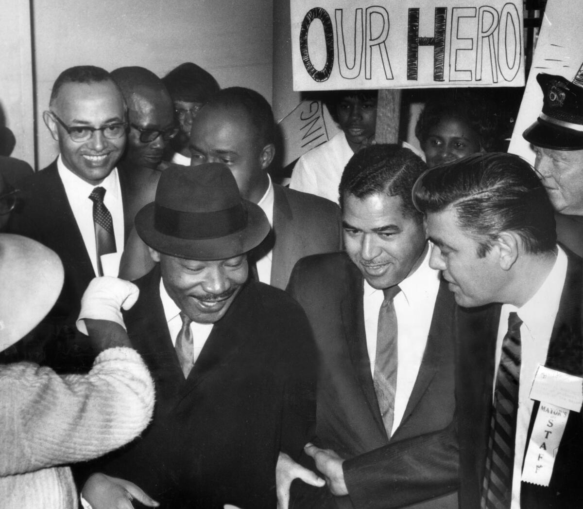Feb. 24, 1965: The Rev. Martin Luther King receives a warm welcome on his arrival in Los Angeles.