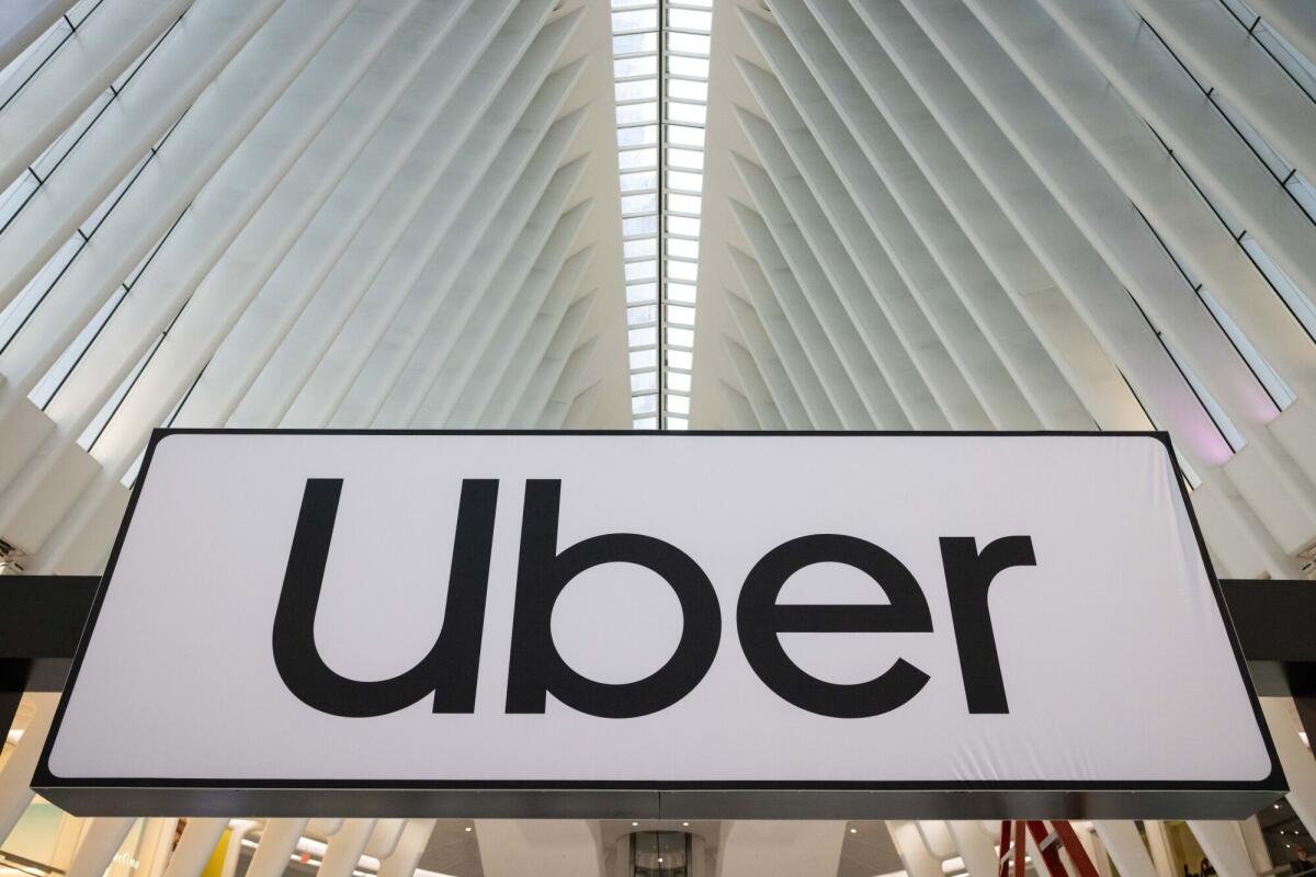 Uber signage during a product unveiling event in New York in 2025.