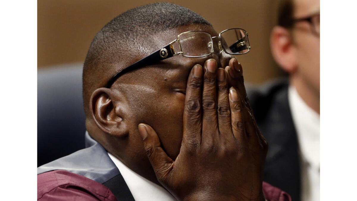 Reggie Cole listens to testimony in a Compton court in 2015. Cole, who served 16 years in prison after he was wrongfully convicted of a 1994 murder, reached a plea deal with prosecutors in an unrelated assault case Friday.