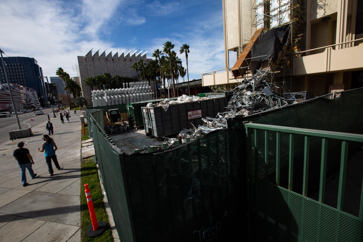 LACMA has begun the construction-abatement process (to remove asbestos, etc.) prior to demolition of four buildings on its Wilshire Boulevard campus.