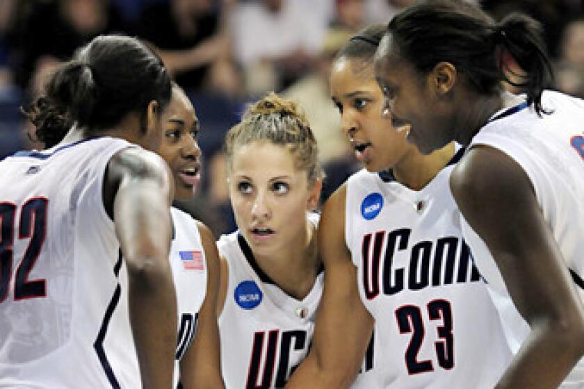 From left, UConn's Kalana Greene, Tiffany Hayes, Caroline Doty, Maya Moore and Tina Charles huddle up during the first round of the women's basketball NCAA Tournament at the Ted Constant Convocation Center at Old Dominion University in Norfolk, Va.
