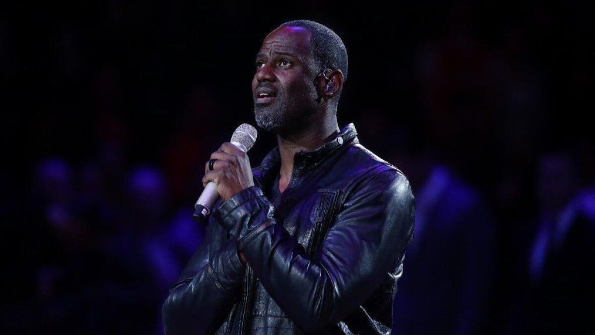 Brian McKnight sings the national anthem before an NBA game between the Clippers and the Memphis Grizzlies in February.