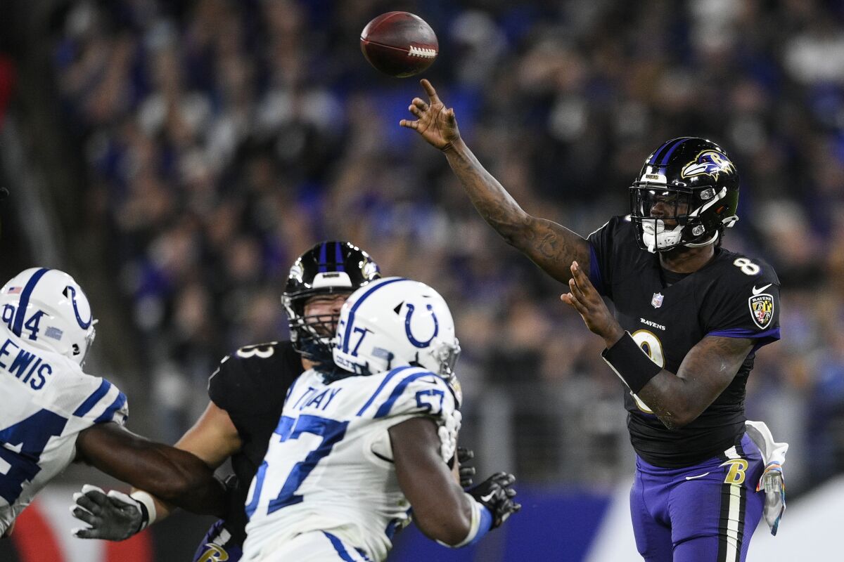 Baltimore Ravens quarterback Lamar Jackson (8) throws the ball during the second half of an NFL football game against the Indianapolis Colts, Monday, Oct. 11, 2021, in Baltimore. (AP Photo/Nick Wass)