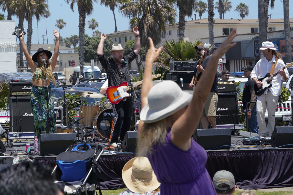 Band Brian Jones Rock ’n’ Roll Revival plays to a crowd Saturday at the Celebrate the OB Vibe festival.