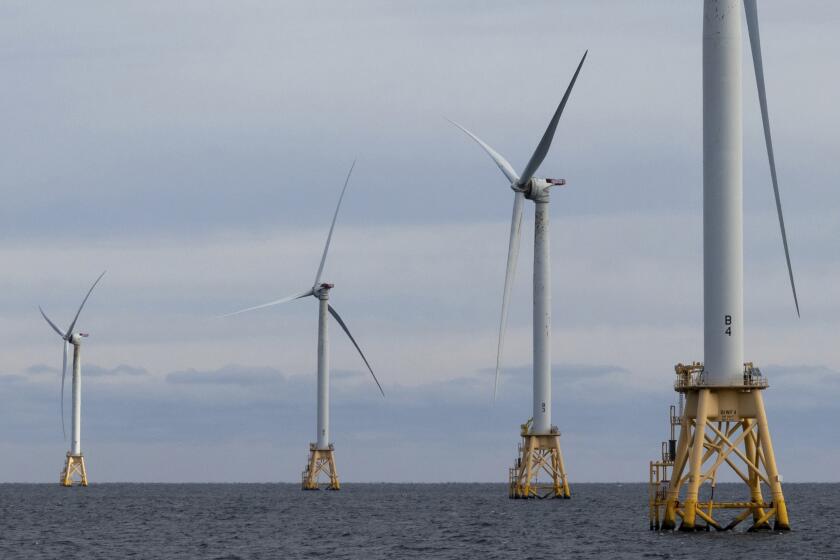 FILE - Turbines operate at the Block Island Wind Farm, Dec. 7, 2023, off the coast of Block Island, R.I. The Biden administration is preparing to announce plans for a new five-year schedule to lease federal offshore tracts for wind energy production, with up to a dozen lease sales anticipated beginning this year and continuing through 2028. The plan was to be announced Wednesday, April 24, 2024, in New Orleans by Interior Secretary Deb Haaland. (AP Photo/Julia Nikhinson, File)