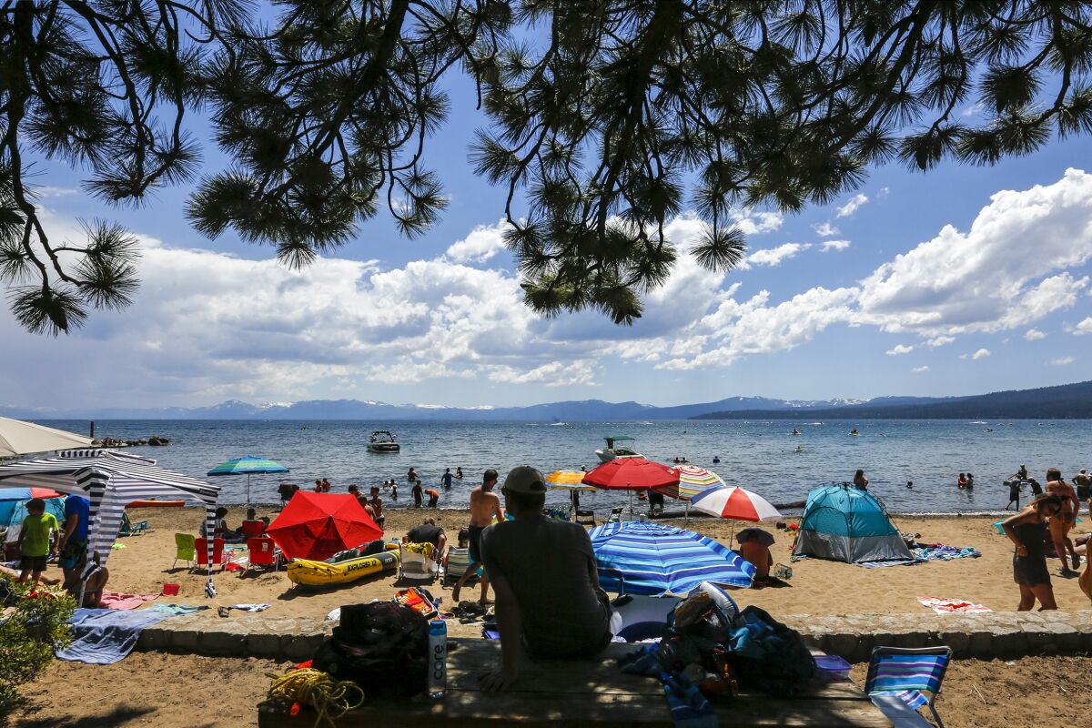 Beachgoers at Kings Beach in Lake Tahoe