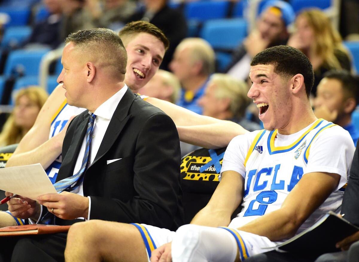 UCLA freshmen Lonzo Ball (2) and TJ Leaf, left, share a laugh during a 102-62 win over UC Santa Barbara on Dec. 14.