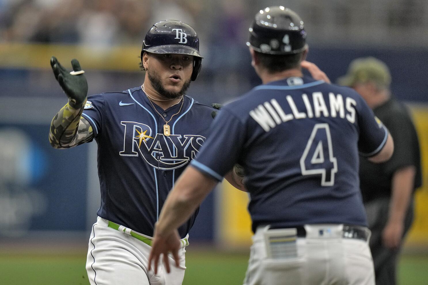 Brewers trade 2 relievers, acquire SS Adames from Rays