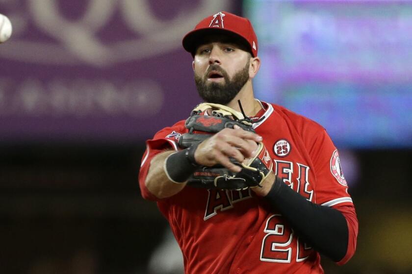 Los Angeles Angels' Kaleb Cowart in action against the Seattle Mariners in a baseball game Saturday, Aug. 12, 2017, in Seattle. (AP Photo/Elaine Thompson)