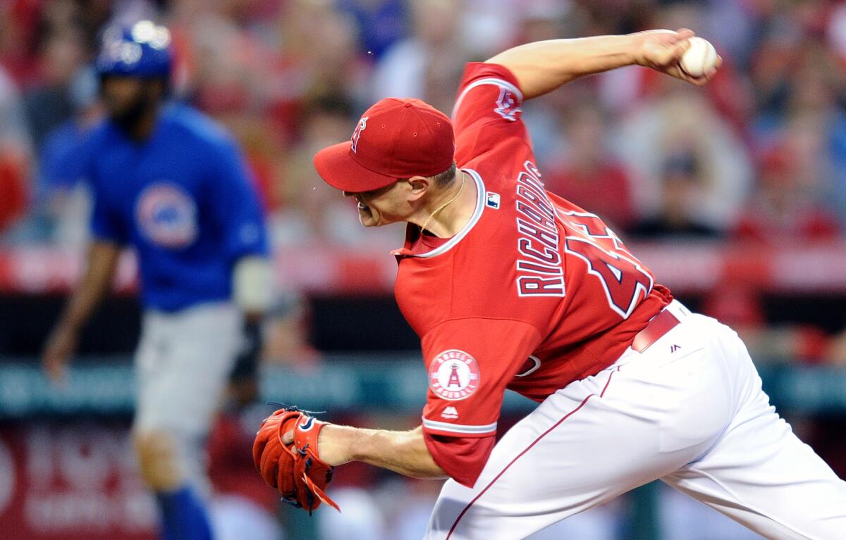 Garrett Richards, pitching for the Angels against the Chicago Cubs in April, is working back from a torn elbow ligament.