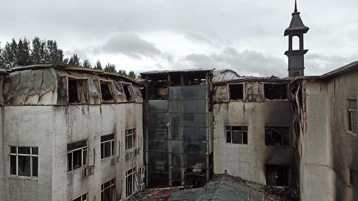 The Beilong Hot Spring Hotel in Harbin, China, after Saturday's deadly fire.