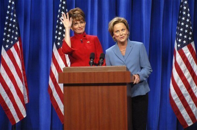 In this Sept. 13, 2008 file photo released by NBC, actress Tina Fey, left, plays Governor Sarah Palin, and actress Amy Poehler plays Senator Hillary Clinton on "Saturday Night Live" in New York. The 2008 Peabody Awards are out, a list of 36 winners that indicates a changing media environment. Among those getting a Peabody, will be "Lost," the ABC adventure serial; "The Giant Pool of Money," an explanation of the current fiscal crisis from public radio's "The American Life", "Black Magic," ESPN's examination of the integration of basketball, and "Saturday Night Live's" political satire during the campaign season. (AP Photo/Dana Edelson, NBCU Photo Bank, File)