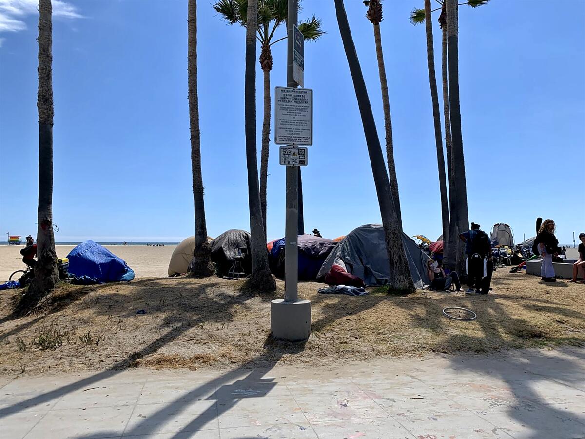 Tents along the Venice boardwalk on June 23, 2021.