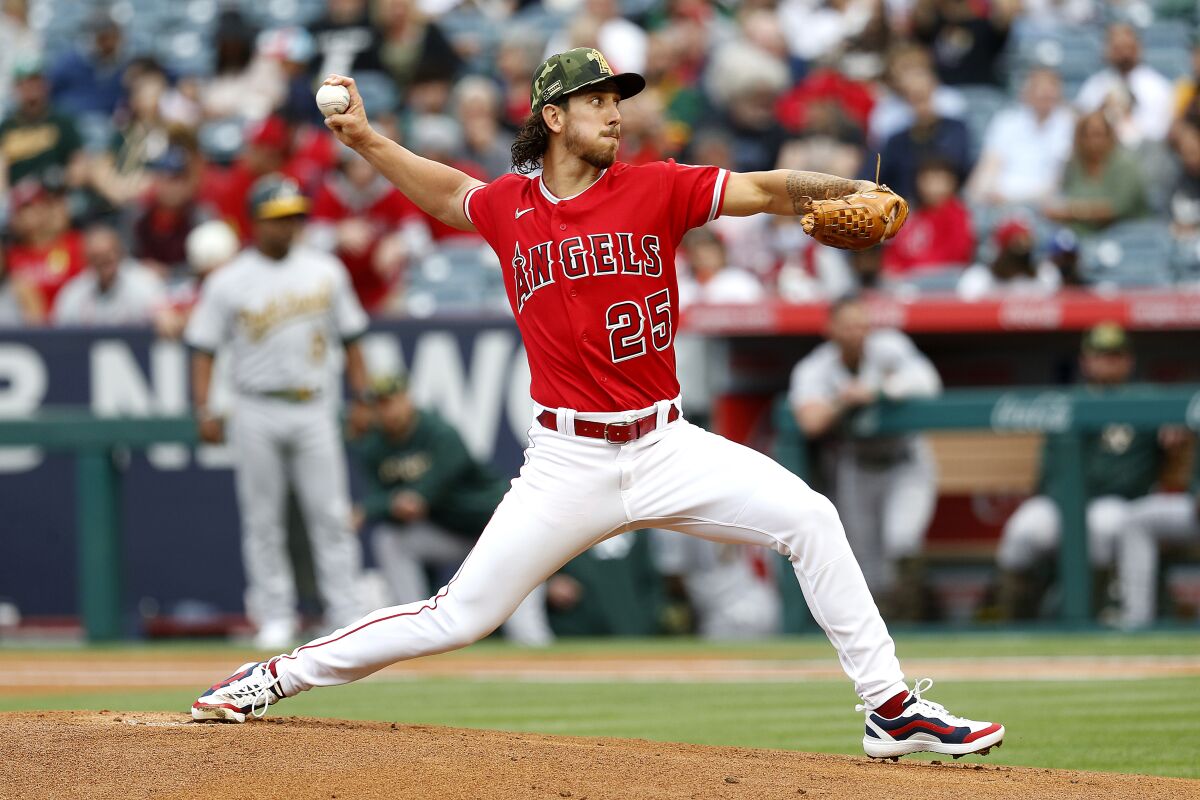 Angels starter Michael Lorenzen pitches against the Oakland Athletics on May 21, 2022.