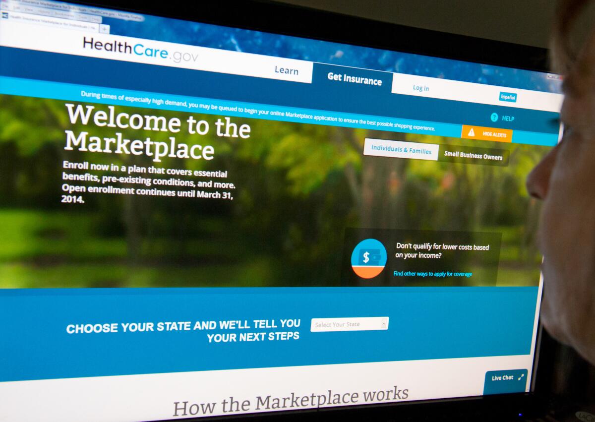 This December 2, 2013 photo shows a woman reading the HealthCare.gov insurance marketplace internet site in Washington, DC. A new poll shows Americans are more concerned with basic healthcare issues such as the cost of insurance,