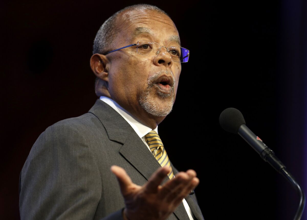 Harvard professor Henry Louis Gates Jr. speaks during an award ceremony for the W.E.B. Du Bois Medal in 2013 in Cambridge, Mass. A "Finding Your Roots" episode that omitted references to Ben Affleck's ancestor as a slave owner violated PBS standards, the public TV service said Wednesday, June 24, 2015. Gates, the series host and executive producer, apologized for forcing PBS to defend the integrity of its programming. He said he's working with public TV on new guidelines to ensure increased transparency.