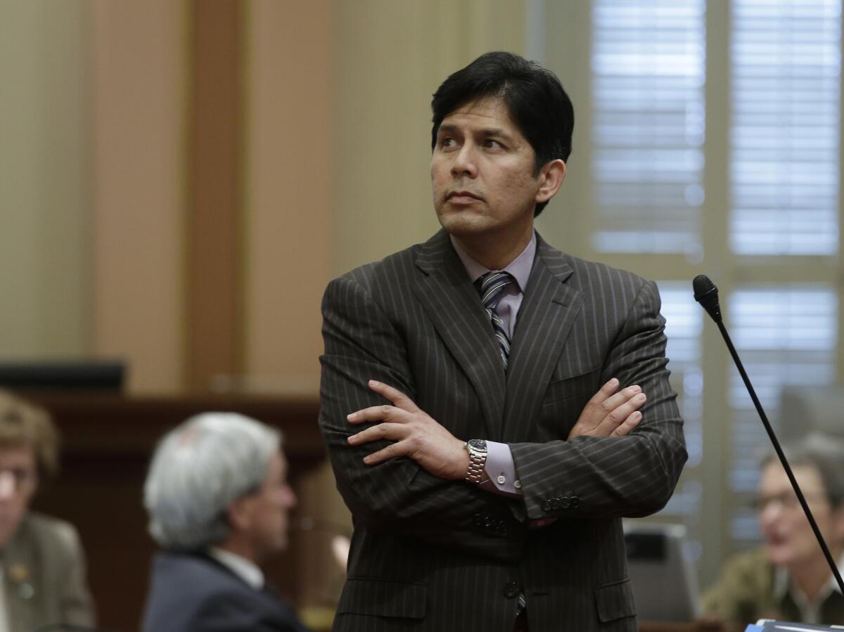 State Senate leader Kevin de Leon, D-Los Angeles, shown during a recent floor session, ordered layoffs Friday in the Senate staff to avoid a budget deficit.