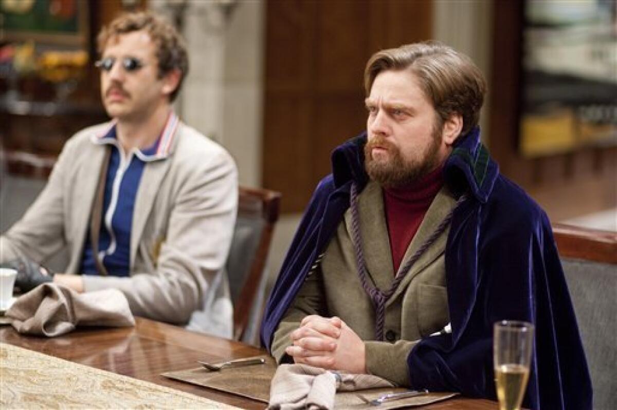 In this film publicity image released by Paramount Pictures, Christopher O'Dowd, left, and Zach Galifianakis are shown in a scene from "Dinner for Schmucks." (AP Photo/Paramount Pictures, Merie Weismiller Wallace)