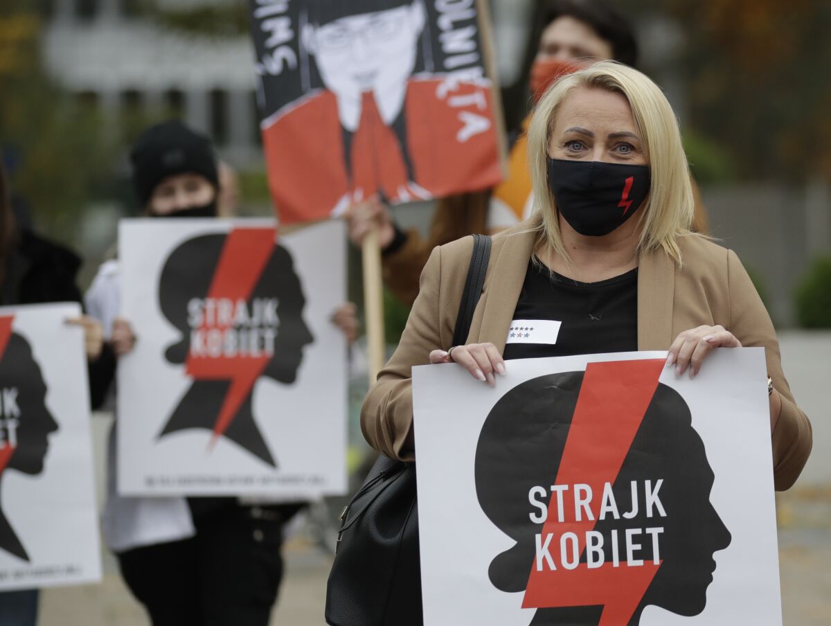 Women's rights activists in Poland protest recent court ruling on abortion.